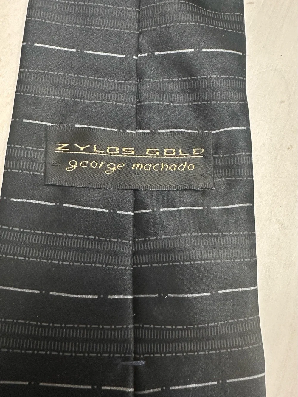 Men's Black Patterned Necktie with Subtle Gray Dash Lines